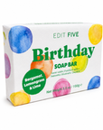 A boxed soap bar package labeled 'EDIT FIVE Birthday SOAP BAR' on a plain white background. The box is white with colorful watercolor-style circles in blue, yellow, pink, orange, and purple, plus green text reading 'Birthday' and 'Bergamot, Lemongrass & Lime'. Refreshing artisan birthday soap made in England using traditional soap-making methods and natural citrus essential oils—a practical, colourful and thoughtful birthday present.
