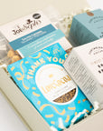 Thank you treat box with Love cocoa thank you chocolate slab, English breakfast tea bags, salted caramel popcorn and milk chocolate chunk biscuits Perfect for mum, dad, sister, friend, employee, client, daughter, son.