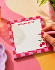 Edit Five 10 x 10cm square memo notepad featuring a bold checkerboard pattern, playful typography and cherry illustration, ideal for saving websites, articles, books, films and ideas to revisit later.