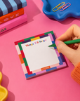 Edit Five 10 x 10cm square memo notepad featuring a bright patchwork design and playful rainbow typography, ideal for capturing quick notes, appointments, ideas, tasks and everyday reminders.