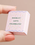 Hooray - let's celebrate Tiny Matchbox Ceramic Champagne Token