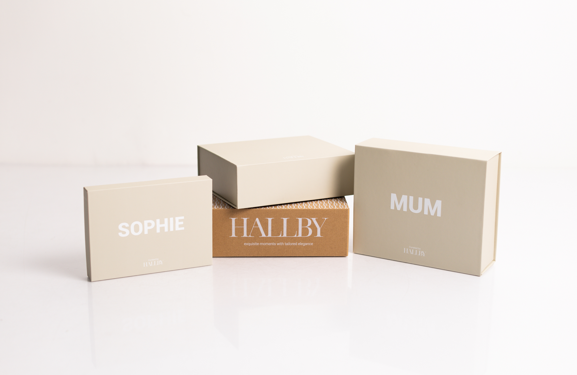 Hallby branded gift boxes of various sizes.