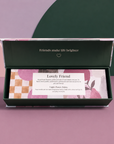 Colourful three-candle gift set featuring roasted coffee and vanilla, fresh bergamot and warm woods, and tobacco leaf, cedarwood and amber fragrances in elegant gold tins.