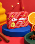 Christmas cinnamon and orange soap bar, handmade in England with 100% natural essential oils and wrapped in colourful candy-cane packaging, perfect as a festive stocking filler.