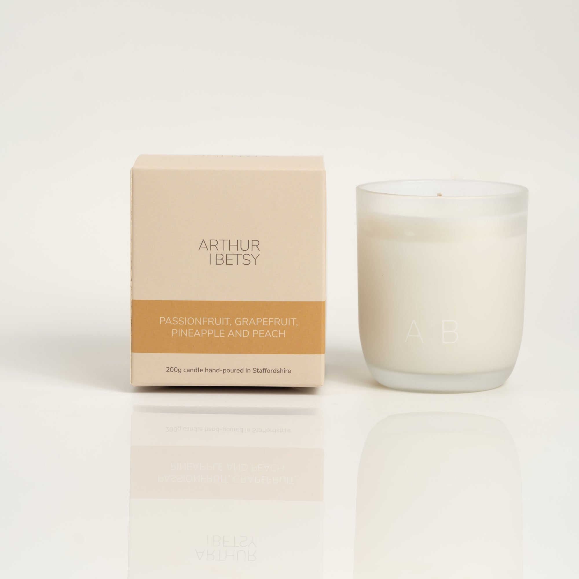 assionfruit, pineapple, grapefruit, and peach with our Arthur Betsy 200g candle with branded box