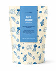 A stand-up pouch of bath salts with a cream background and blue ocean-themed illustrations, featuring a large blue label that reads 'EDIT FIVE DEEP EXHALE BATH SALTS'. Handmade aromatherapy bath salts featuring an equal blend of Epsom salts and mineral-rich Dead Sea salts with pure bergamot, frankincense and cedarwood essential oils.