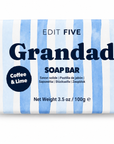 A rectangular bar of soap wrapped in white and light blue watercolor-style vertical stripes, with large dark blue text reading 'Grandad' and smaller text 'EDIT FIVE' and 'Coffee & Lime' on a clean white background. Colourfully packaged 100g Grandad soap bar with a refreshing citrus and coffee fragrance, natural essential oil and gentle exfoliation, ideal for gift hampers and men’s grooming sets.