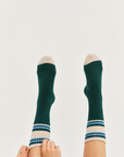 Colourful women’s wool-blend socks featuring contemporary green, peach and blue stripes—a stylish fashion accessory, cosy winter essential and thoughtful gift for her.