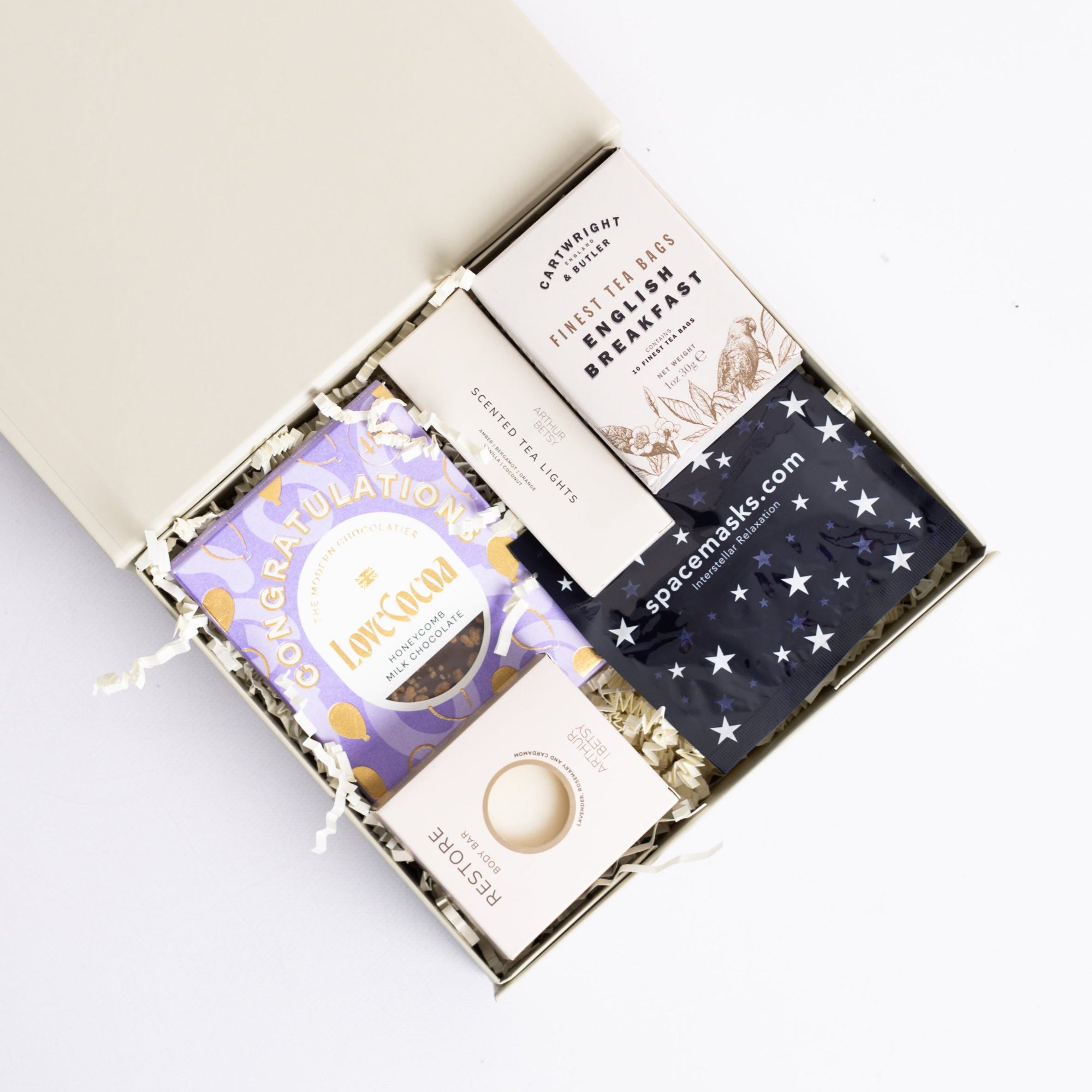 Congratulations gift box with Love cocoa congratulations chocolate slab, 3x scented tea lights set, English breakfast tea bags, restore soap bar, space self-heating eye mask. Perfect for mum, dad, sister, friend, employee, client, daughter, son.