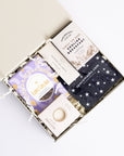 Congratulations gift box with Love cocoa congratulations chocolate slab, 3x scented tea lights set, English breakfast tea bags, restore soap bar, space self-heating eye mask. Perfect for mum, dad, sister, friend, employee, client, daughter, son.