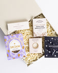 Congratulations gift box with Love cocoa congratulations chocolate slab, 3x scented tea lights set, English breakfast tea bags, restore soap bar, space self-heating eye mask. Perfect for mum, dad, sister, friend, employee, client, daughter, son.