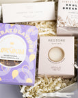 Congratulations gift box with Love cocoa congratulations chocolate slab, 3x scented tea lights set, English breakfast tea bags, restore soap bar, space self-heating eye mask. Perfect for mum, dad, sister, friend, employee, client, daughter, son.