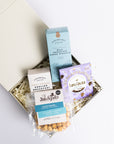 Congratulations Hamper with Milk chocolate chunk biscuits, Love cocoa congratulations chocolate slab, salted caramel popcorn and English breakfast tea bags. Perfect for mum, dad, sister, friend, employee, client, daughter, son.