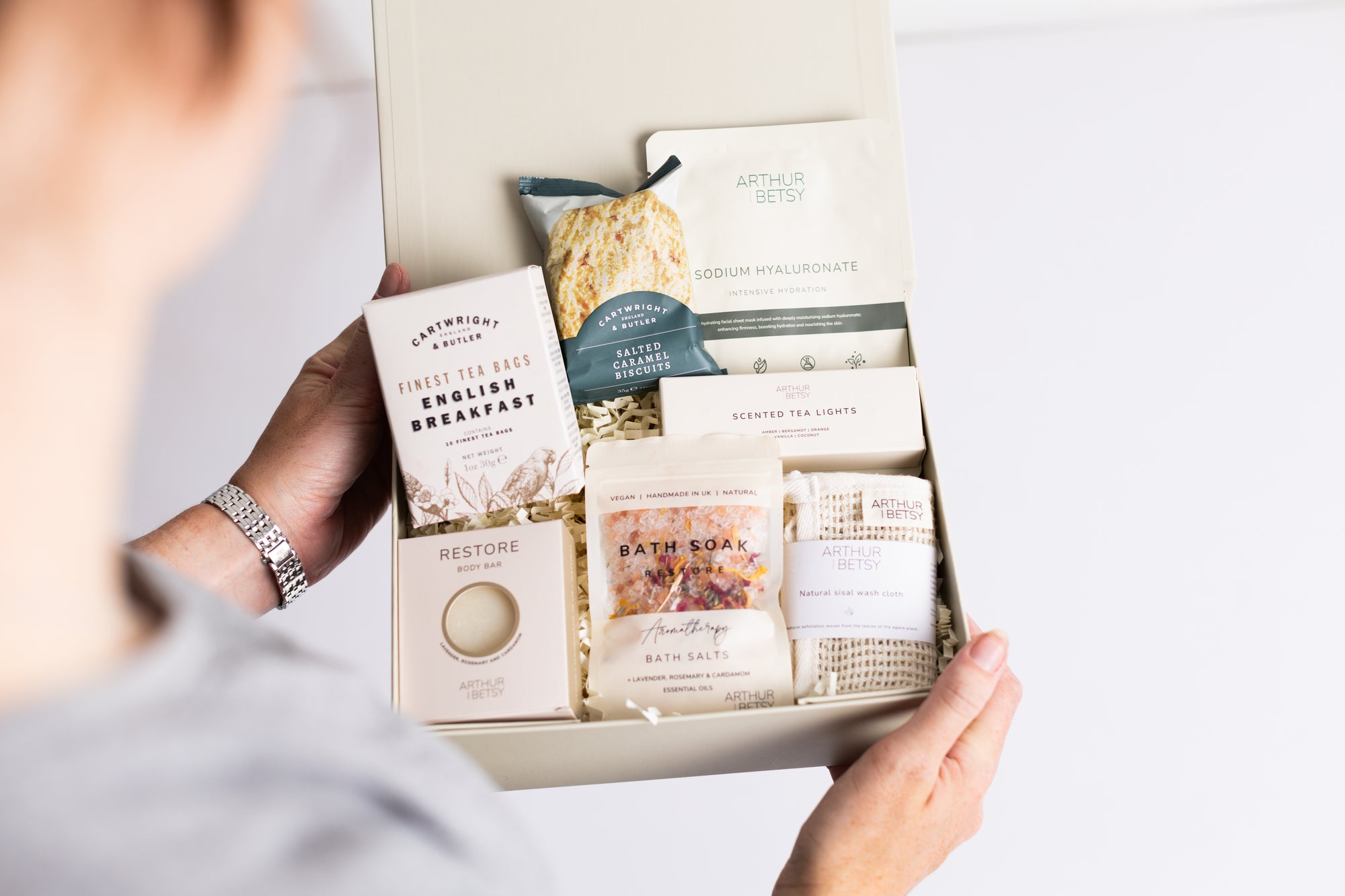 Head to toe spa box with sheet mask, natural sisal wash cloth, salted caramel biscuits, 3x scented tea lights, restore bath soak, English breakfast tea bags Perfect for thank you gifts, Christmas gifts, birthday gifts, congratulations gifts, client gifts, employee gifts or just because gifts.