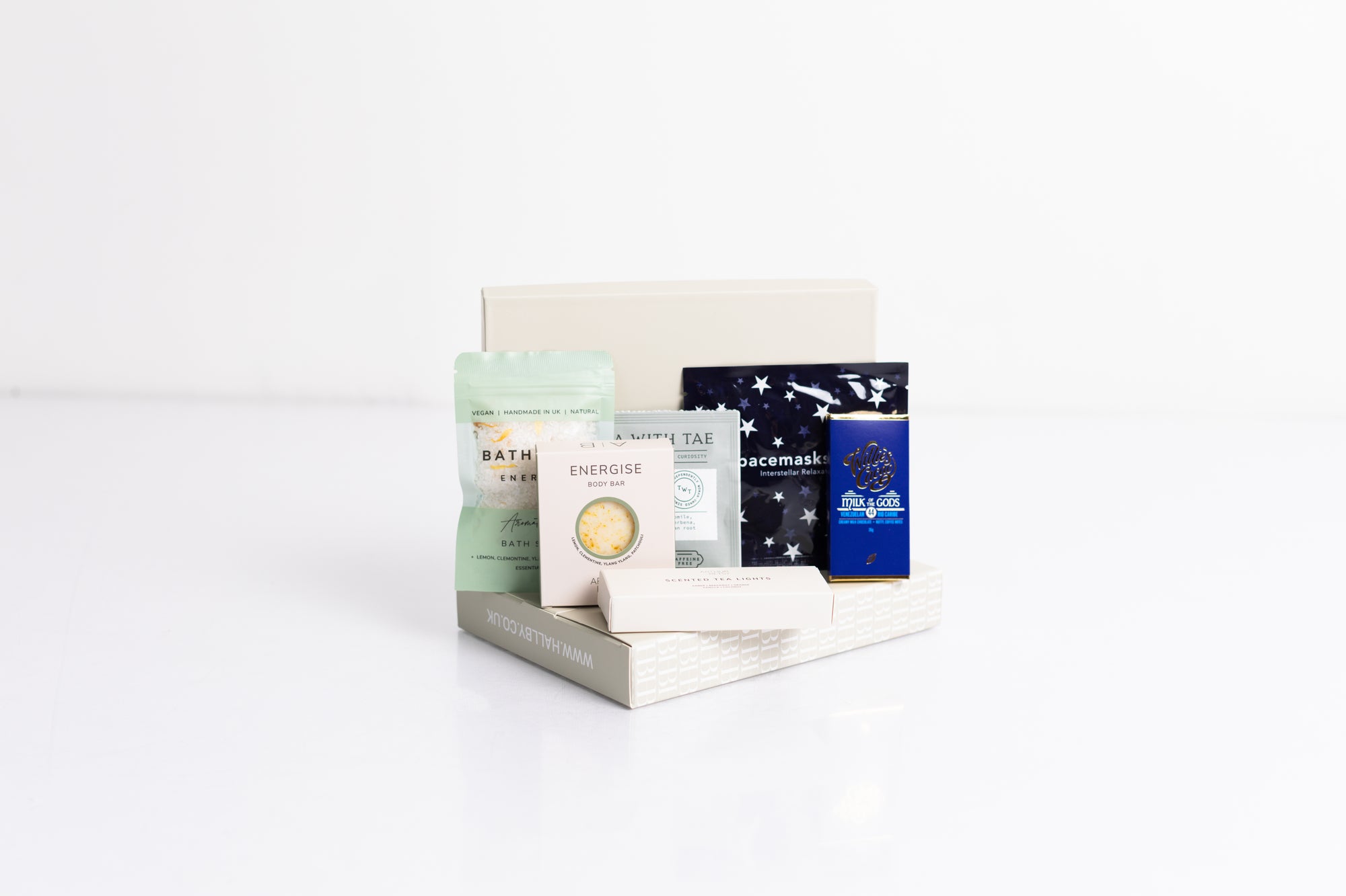 Relax box with space self-heating eye ask, sleep tea bag, 3x scented tea lights, energise bath soak, energise soap bar and milk chocolate bar. Perfect for thank you gifts, Christmas gifts, birthday gifts, congratulations gifts, client gifts, employee gifts or just because gifts.