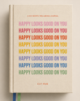 “Happy Looks Good On You” six-month guided wellbeing journal with daily prompts, weekly reflections, gratitude exercises, habit trackers and monthly check-ins for mindful living.
