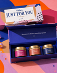 “Wishes Just For You” luxury candle gift set featuring three scented gold candle tins in Morning Ritual, Golden Hour and After Dark, presented in a colourful magnetic keepsake gift box.