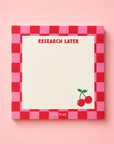 Pink and red checkerboard “Research Later” memo pad with 50 tear-off sheets and a spacious writing layout for research notes, reading lists, recommendations, reminders and creative ideas.