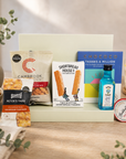 Luxury thank you letterbox gift hamper with Thanks a Million chocolate bar, Bombay Sapphire gin, sweet chilli peanuts and cashews, artisan shortbread, sourdough crackers and strawberry conserve in a premium Hallby gift box.